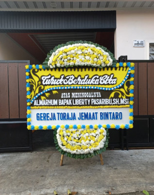 Papan Bunga Duka di Kalis
